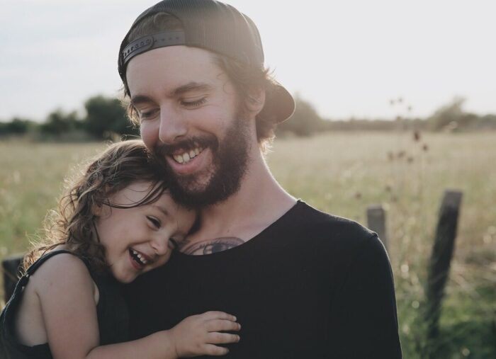 Father Holding Daughter